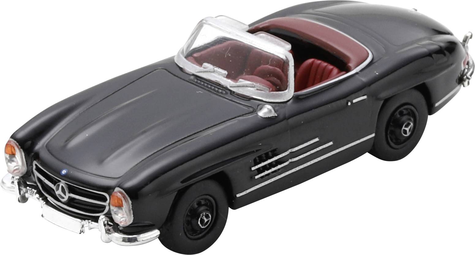 Black classic Mercedes-Benz convertible model car with red interior, shown on a white background.