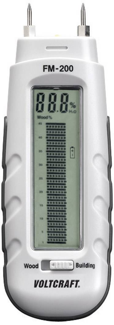 Moisture meter with digital display showing 88.8% H2O. Suitable for wood and buildings, brand Voltcraft, model FM-200.