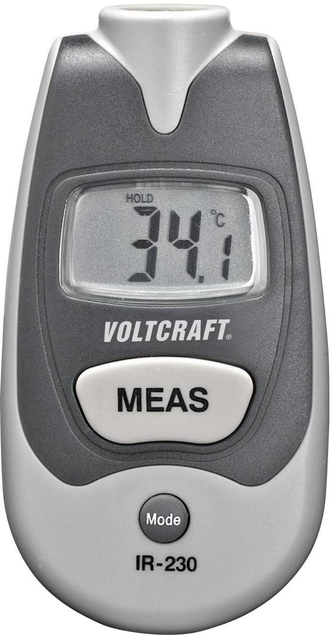 Digital infrared thermometer shows 34.1 °C. Device with grey casing and buttons for 'MEAS' and 'Mode'. Brand name 'Voltcraft'.