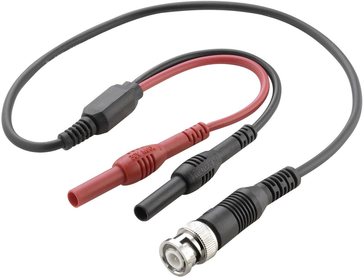 A BNC cable with two banana plugs in red and black. It is frequently used to connect measurement technology devices.