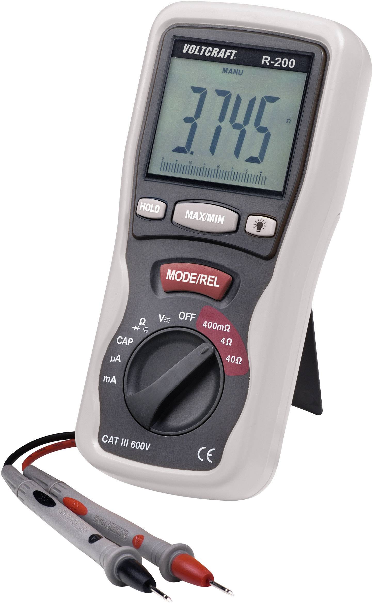 A digital multimeter is displaying a reading of 3.745. It has two probes for electrical measurements and a stand on the back.