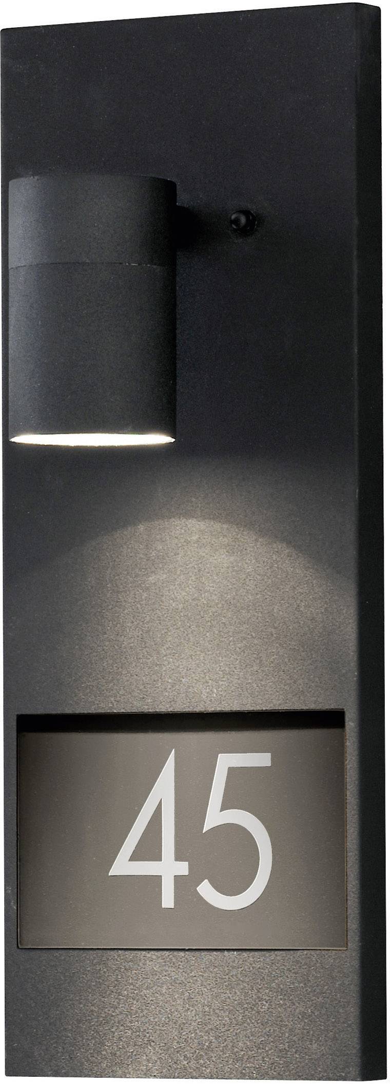 Black outdoor light illuminating house number '45'.