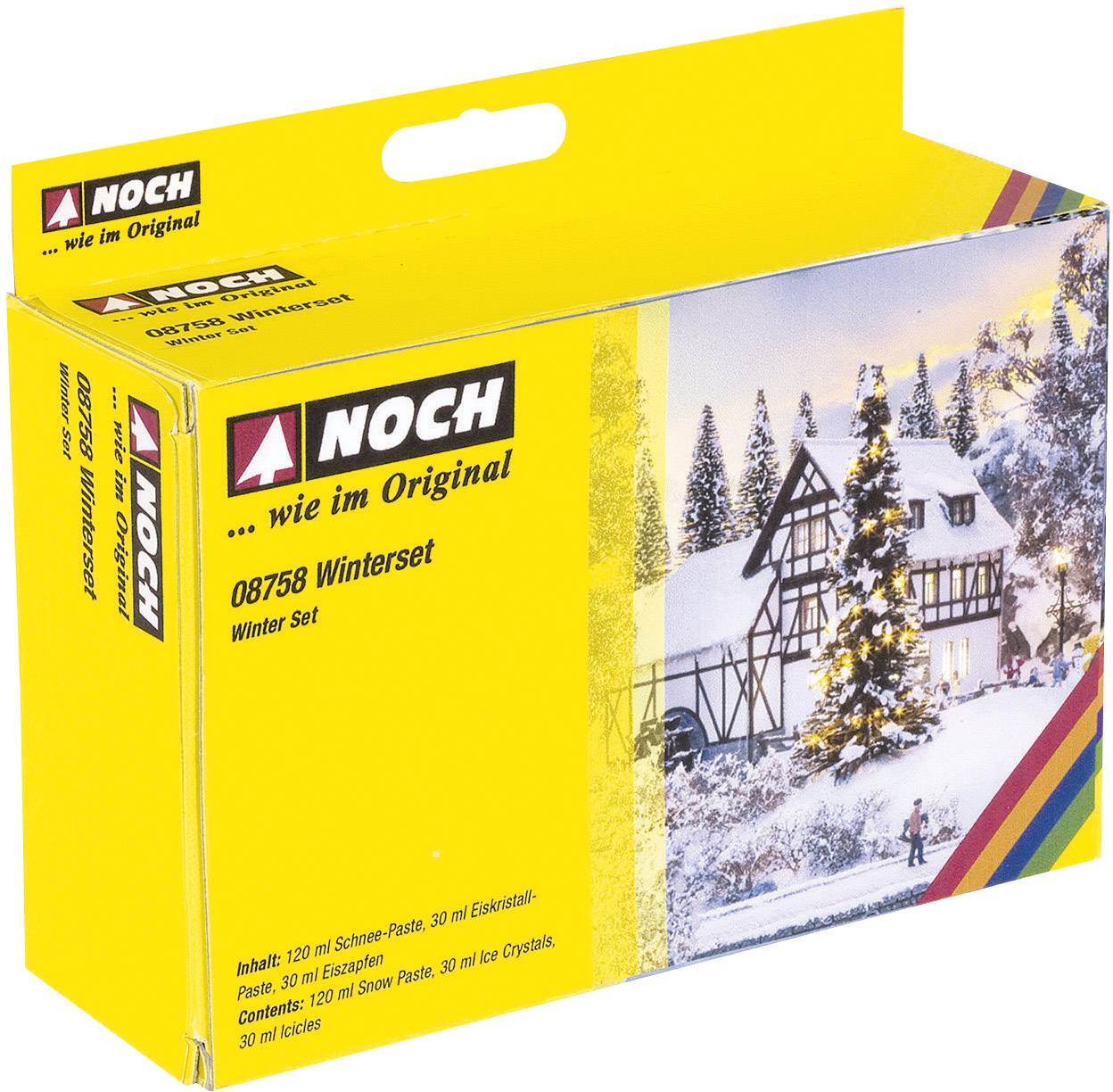 A model railway packaging by NOCH with the label 'Winter Scene'. Depicts a snow-covered landscape with a half-timbered house in the background.
