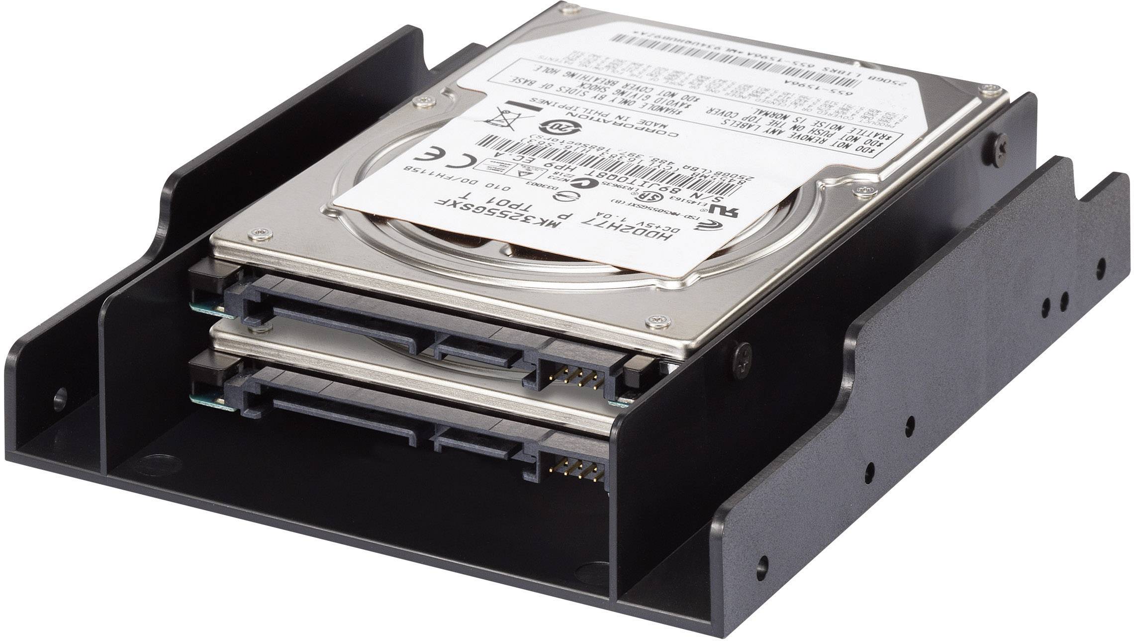 Two stacked hard drives in a metal enclosure.