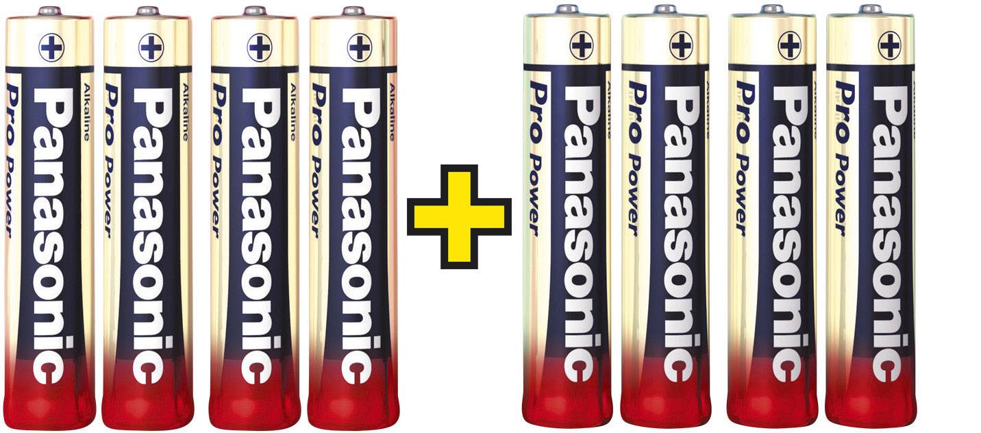 Eight Panasonic AA batteries placed side by side with a yellow plus sign in between, separating two groups of four batteries each.