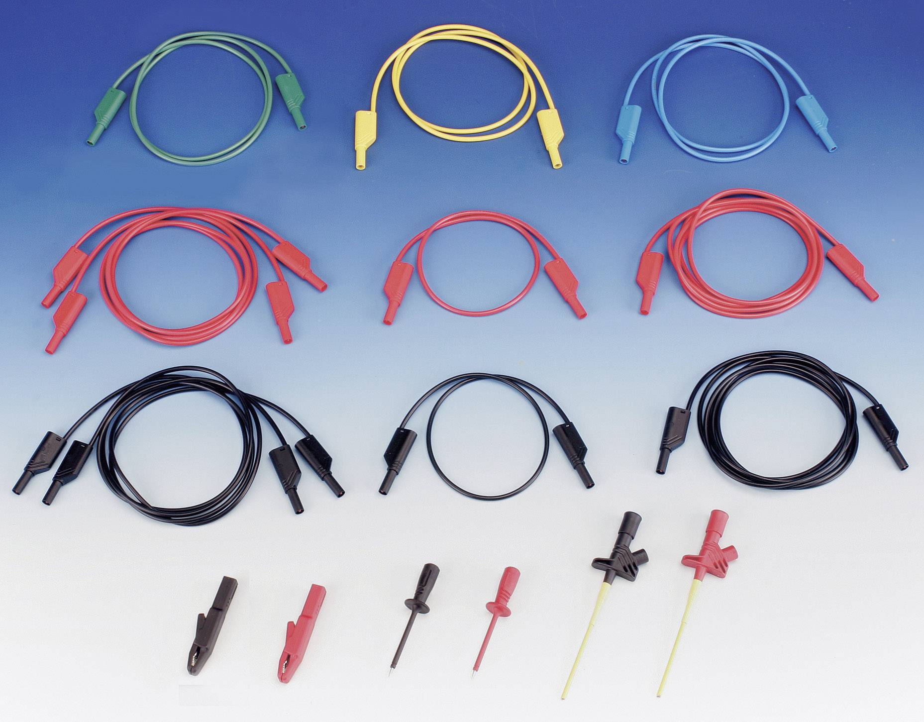 Multicoloured cables and test probes in red, black, yellow, blue, green. Used for electronic connections and testing.