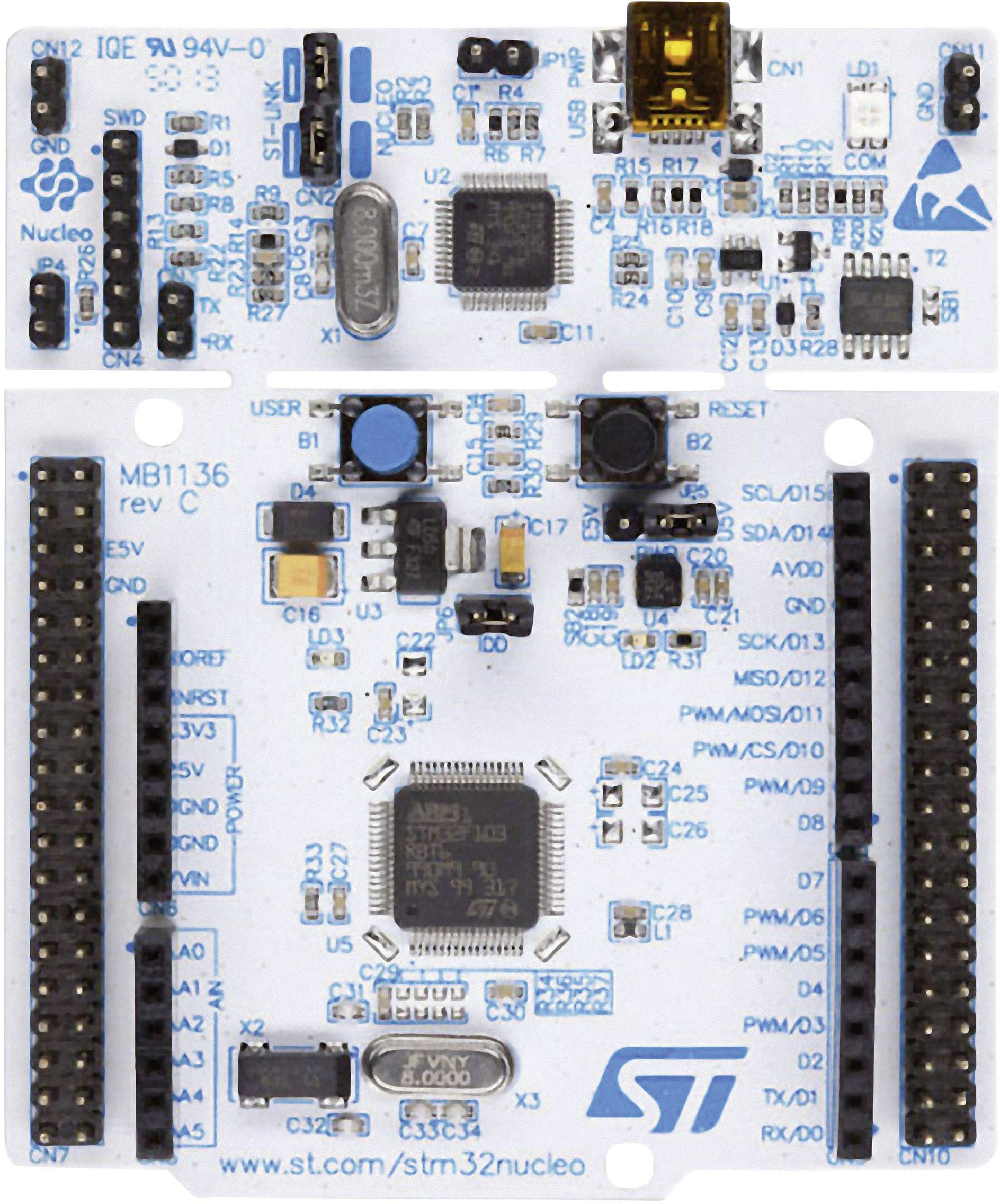 Microcontroller development board with various electronic components and interfaces, suitable for prototype creation and testing.