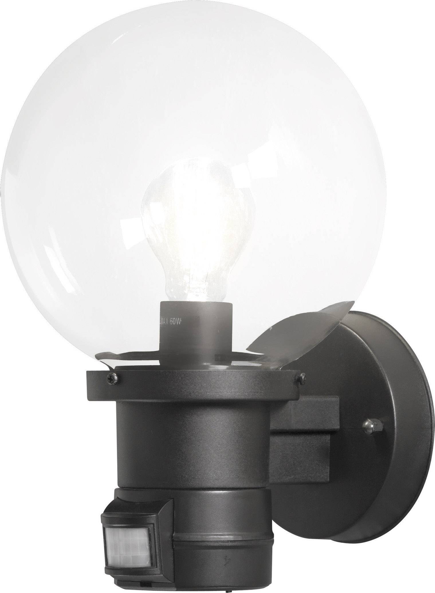A round external wall light with a transparent glass shade. It has a black metal mounting and is illuminated.