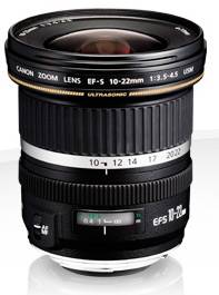 A camera lens with the inscription 'Canon Zoom Lens EF-S 10-22mm f/3.5-4.5 USM'. It is a wide-angle zoom lens.