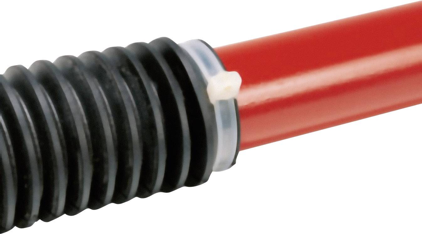 Red hose, partly surrounded by black corrugated pipe, is secured with a transparent clip.