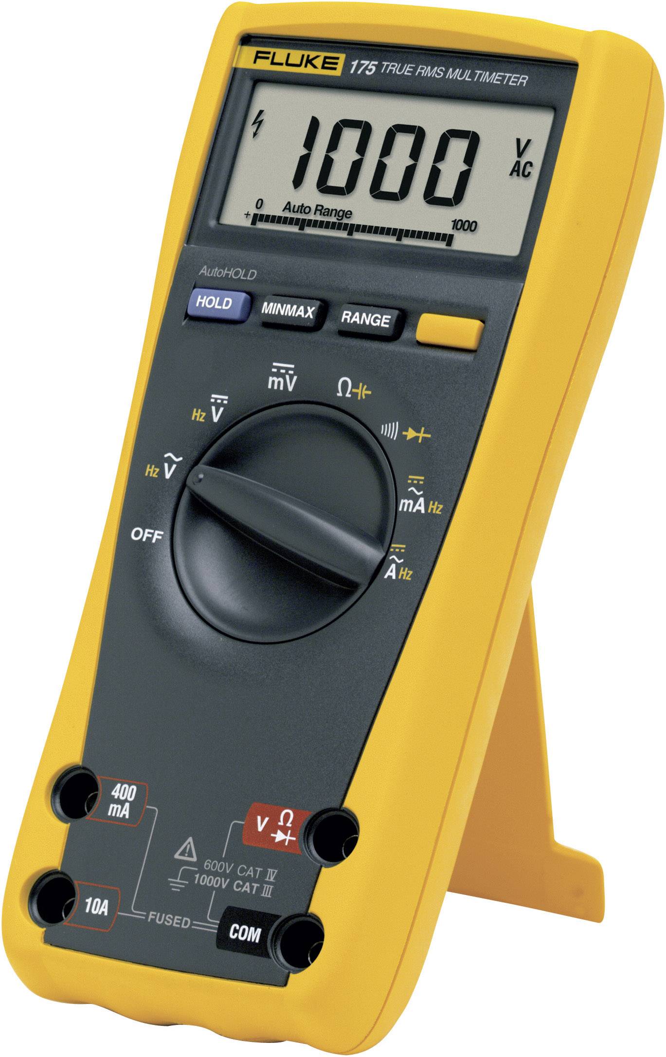 A digital multimeter with a yellow casing displays a reading of '1000 V AC' on its display, surrounded by a rotary switch and buttons.