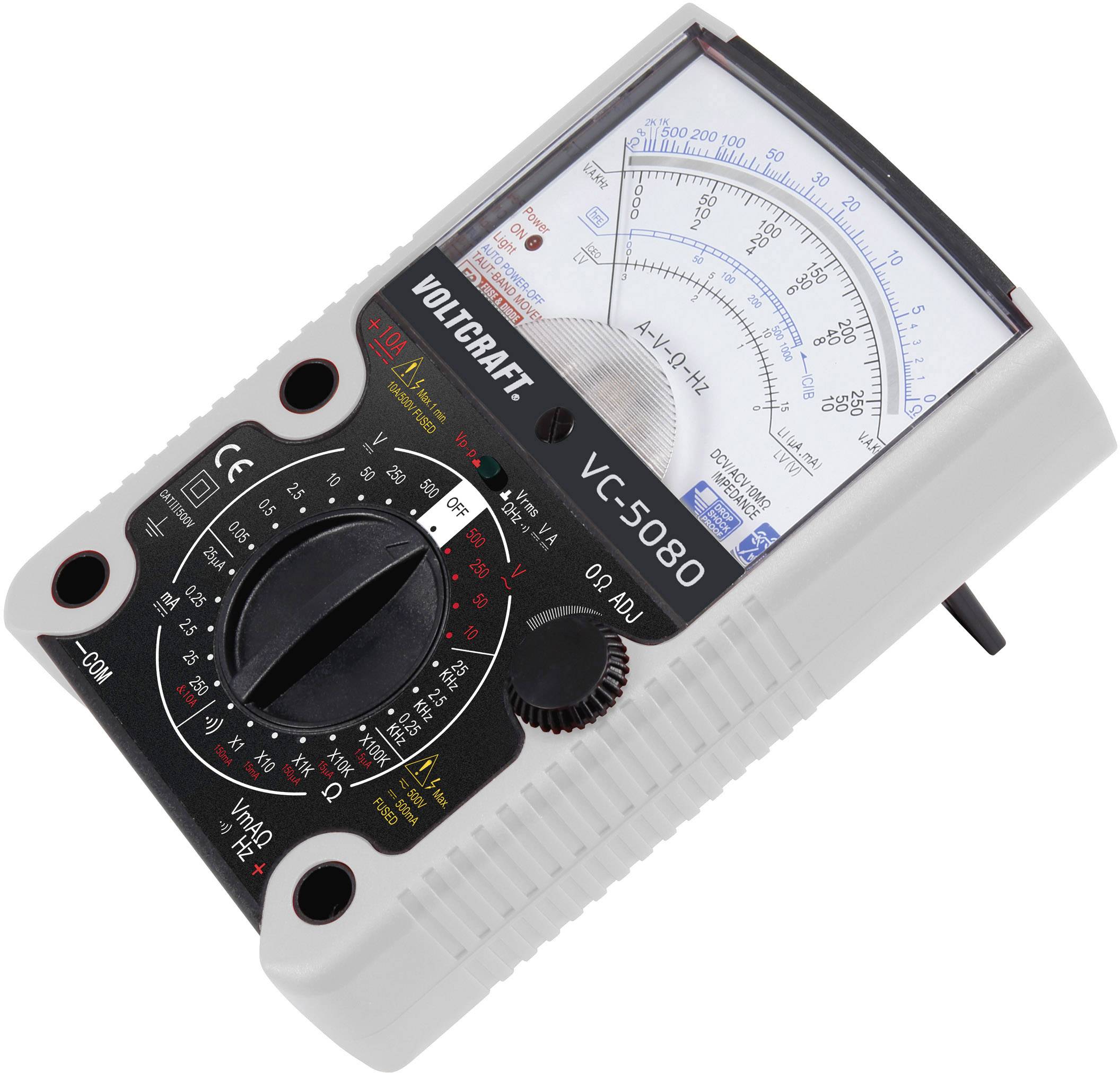 Analogue multimeter with scale, rotary dial for selecting measurement ranges and terminals for voltage and current measurement.