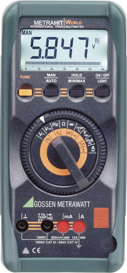 A digital multimeter displays 5.847 volts. It has a green casing and a rotary switch for selecting measurement functions.