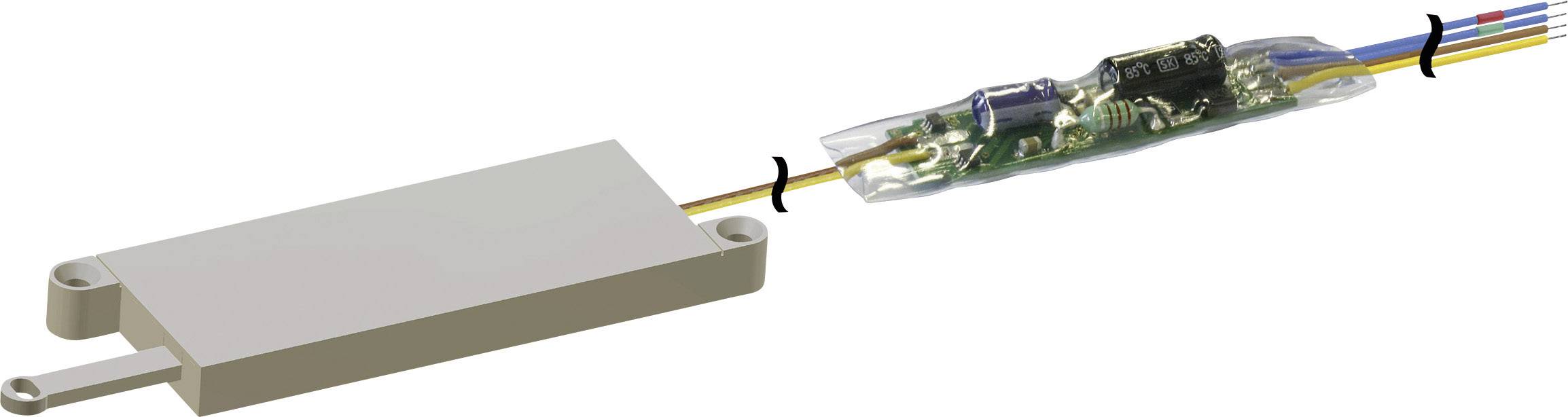 A rectangular, oblong white electrical device with a circuit board-like component and coloured wires connected together on the right side.