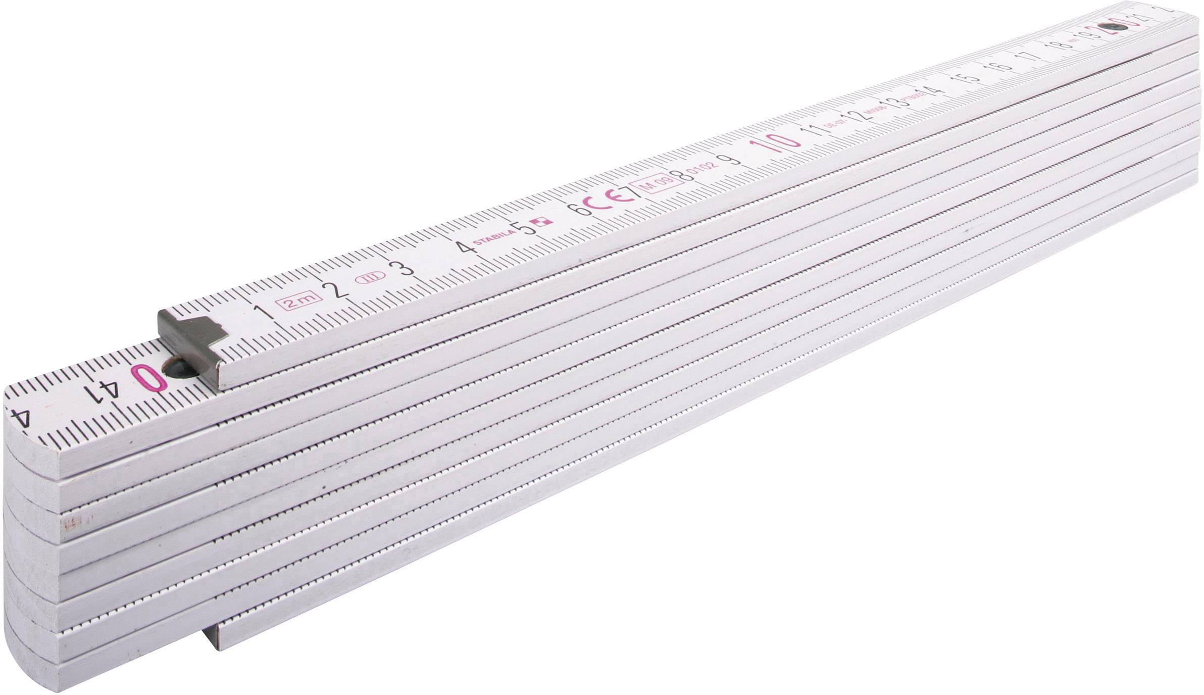 A white, folded ruler with red and black markings is lying on a flat surface.