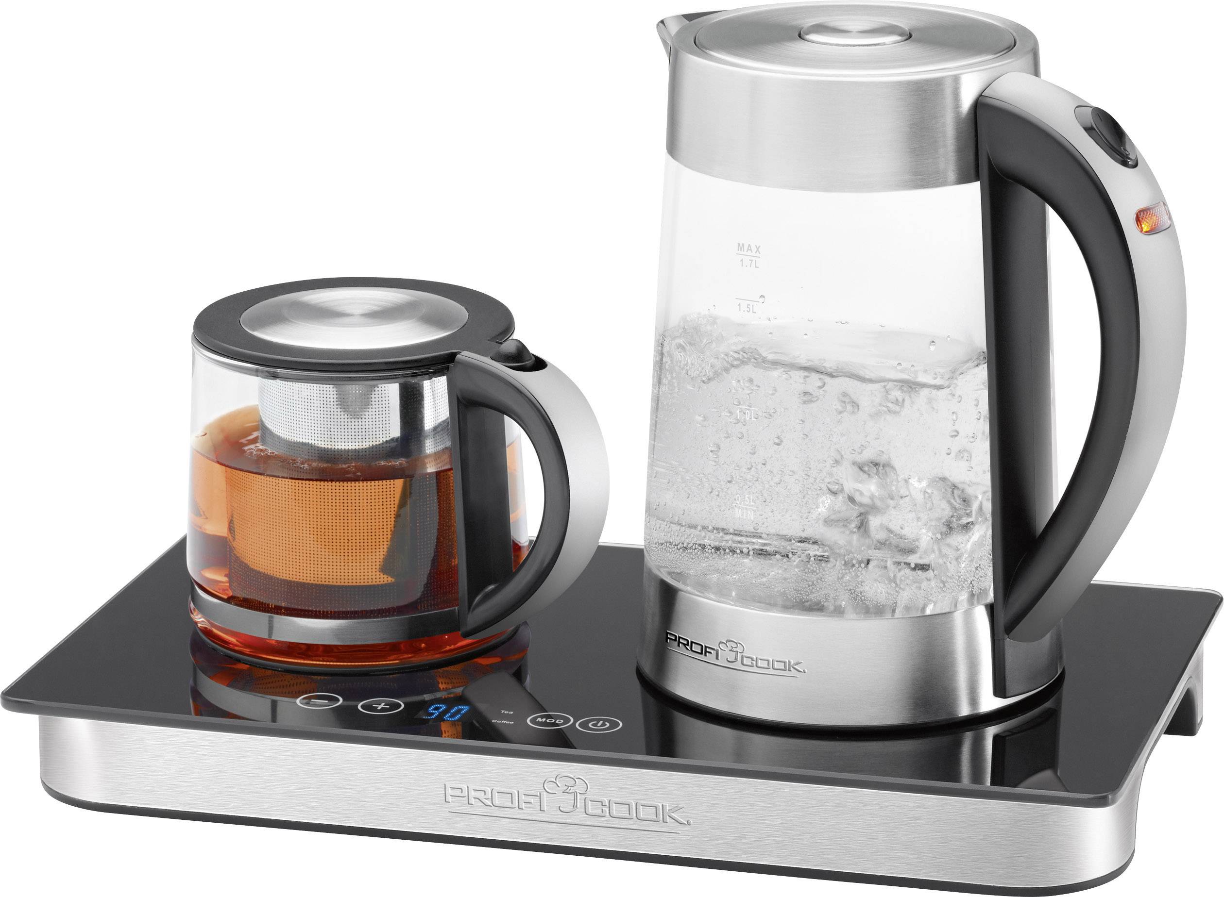 Electric kettle with teapot on a hot plate. Water boiling in the kettle, tea brewing in the teapot.