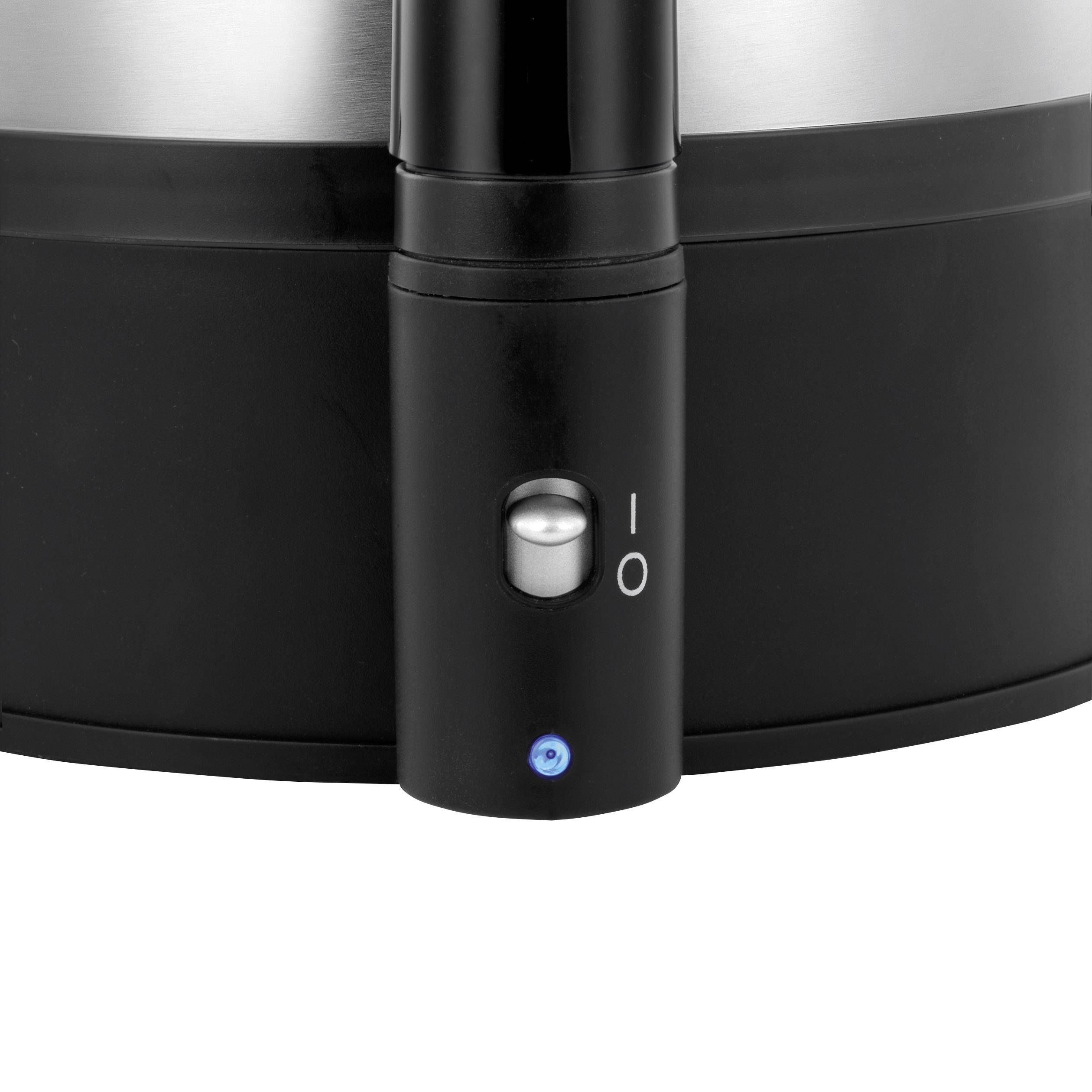 Close-up of a black kettle with a silver lid and a blue, illuminated power switch.