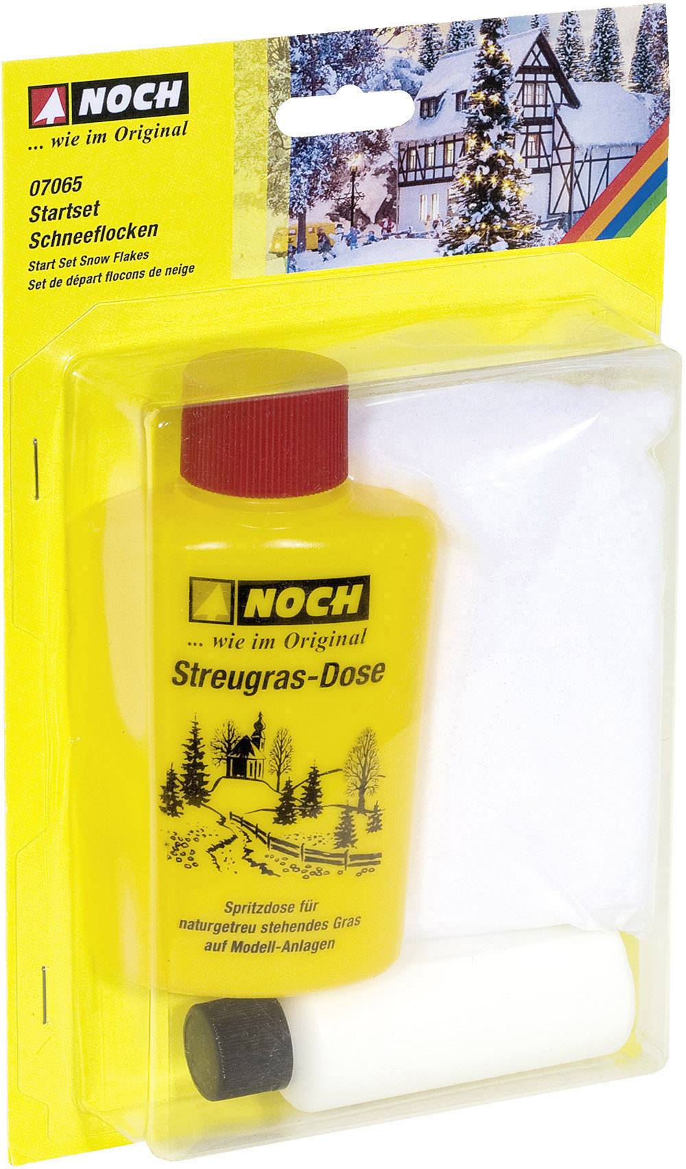 Yellow scatter grass set with 'Scatter Grass Tin' label. Contains snowflakes for model layouts, alongside instructions in a clear packaging.