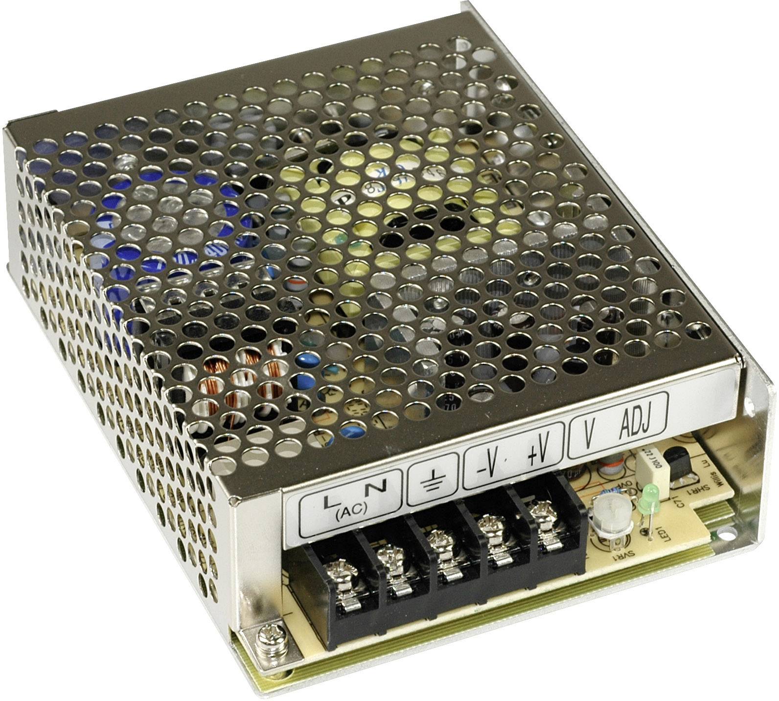 Metallic power supply unit with ventilation holes. Connections and configuration options visible at the front. Internal wiring discernible.