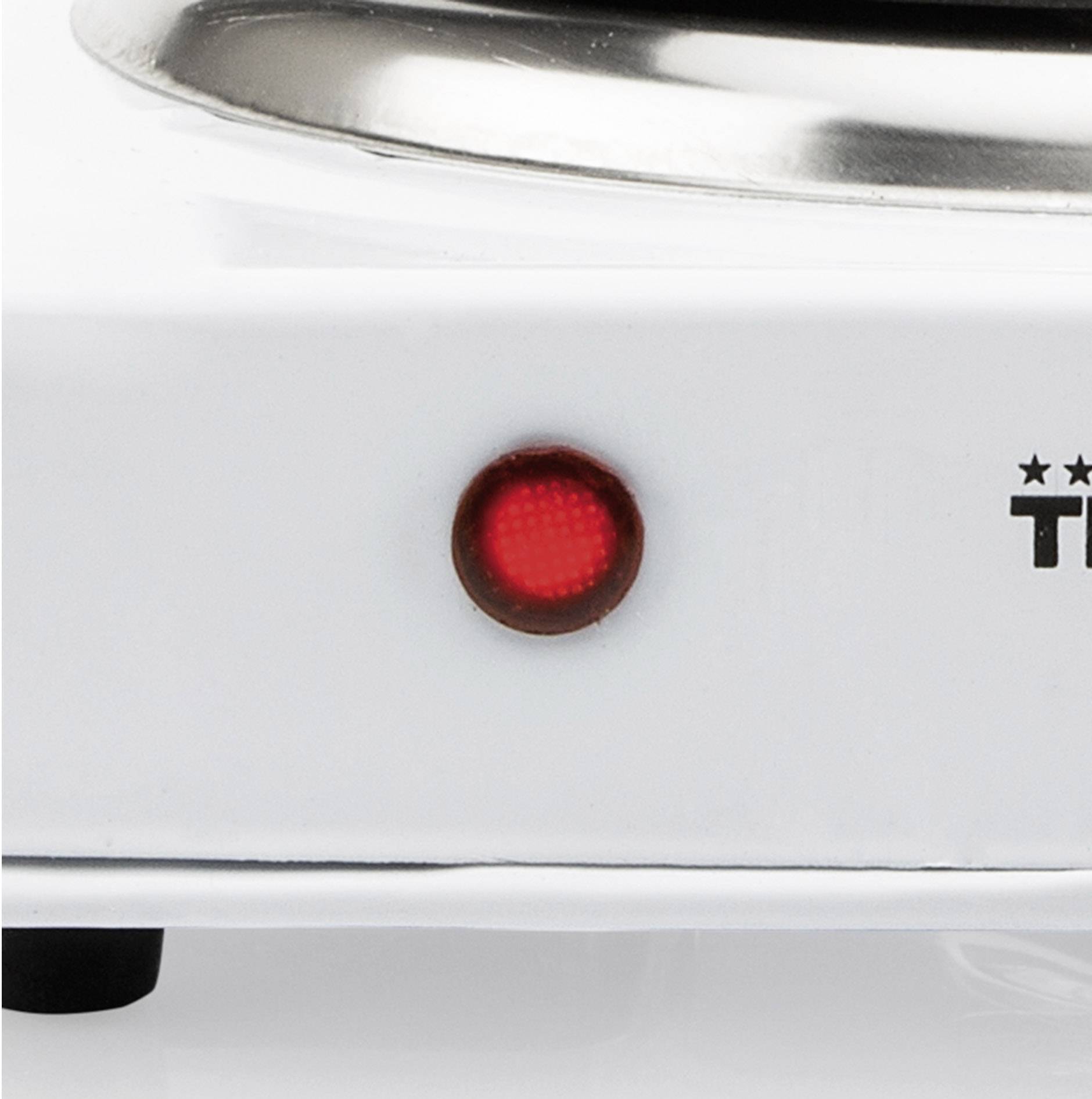 A red control light on a white electrical device indicates the operating status.