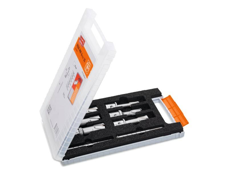 An open plastic case contains several drill bits on black foam. The case lid is slightly ajar.