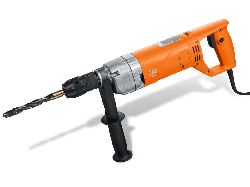 An orange electric drill with a black handle and metal drill bit. It is used for DIY and craftwork.