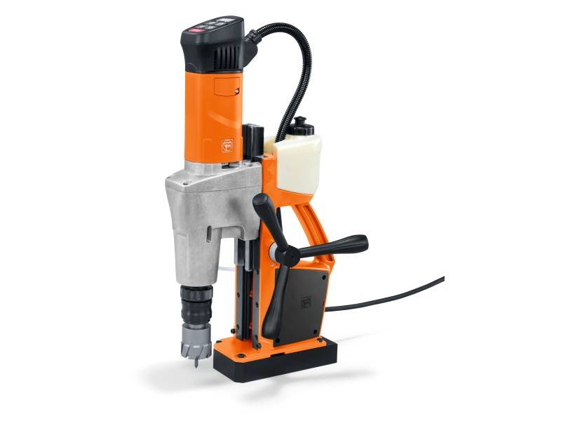 Electromagnetic drill in orange and silver, with power cable and handle, designed for precise drilling into metal surfaces.