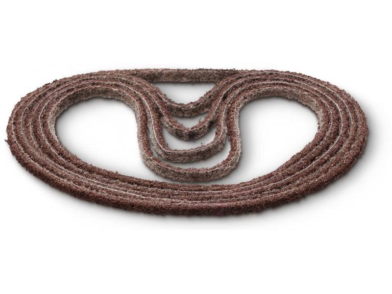 An oval, multiple cord spiral made of rope or bark material, forming a decorative shape on a white background.
