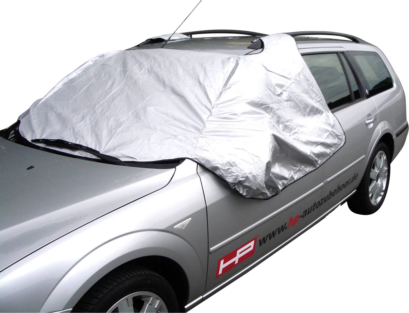 A car with a silver cover over the windscreen, protecting against frost and weather. The vehicle is parked in a car park.