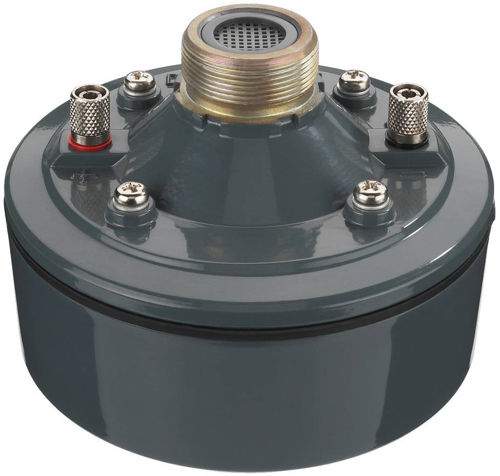 A cylindrical, grey sensor with multiple connectors and a grid on top, presumably an electronic device for measurement.