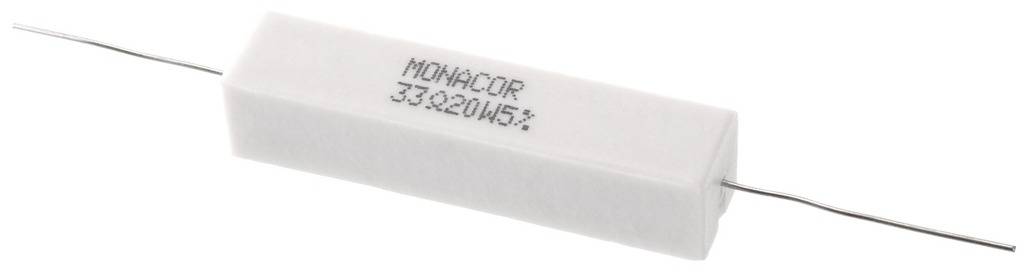 A white cylindrical high-load resistor with the inscription 'MONACOR 33Ω 20W ±5%'.