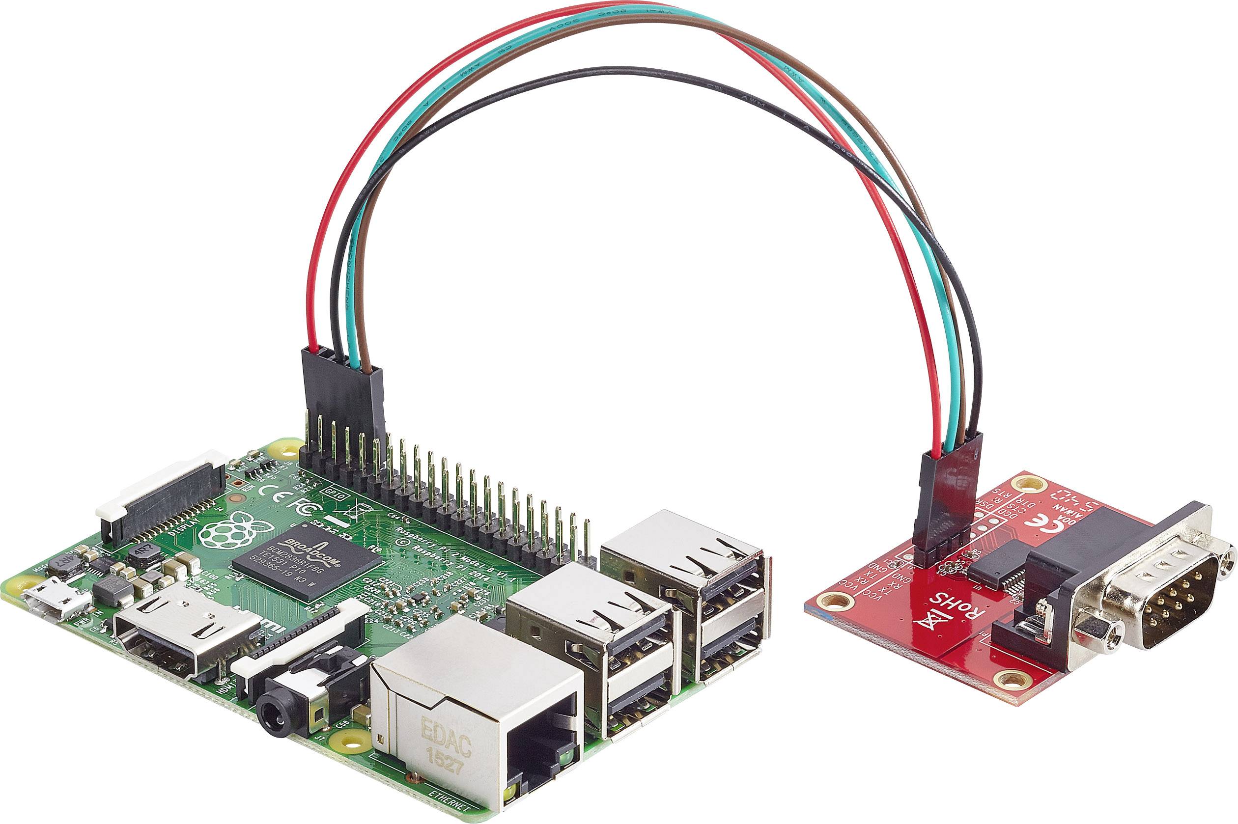 A microcontroller board with USB ports is connected to a red adapter board via three cables.