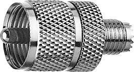 Metallic adapter designed to connect two cable connections. The surface structure is ribbed for improved grip.