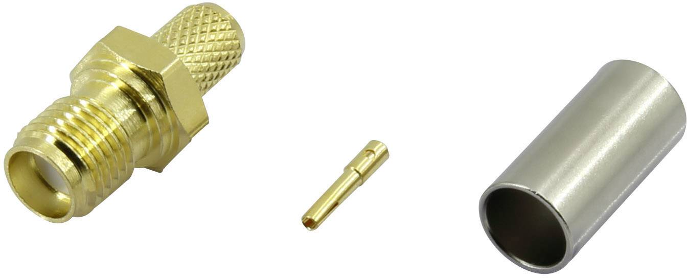 Gold-coloured coaxial adapter with knurled end and central pin, next to a silver cylindrical housing.