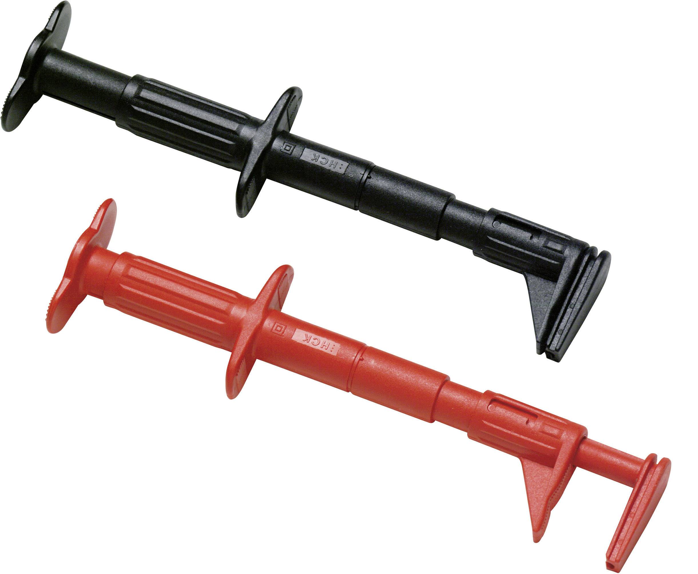 Two electrical clamps, one black and one red, on a white background. They are used for securely connecting electrical wires.