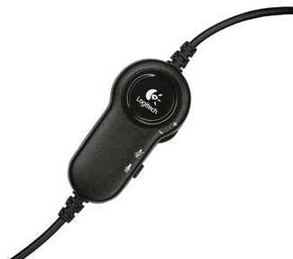Black inline controller with volume control, microphone and volume buttons, connected by cables, serves for audio control.