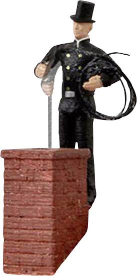 A chimney sweep in traditional uniform stands beside a red brick chimney and holds a cleaning brush.