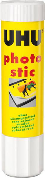A UHU glue stick with a yellow label, specifically for photos. Text: 'photo stic', 'solvent-free'.