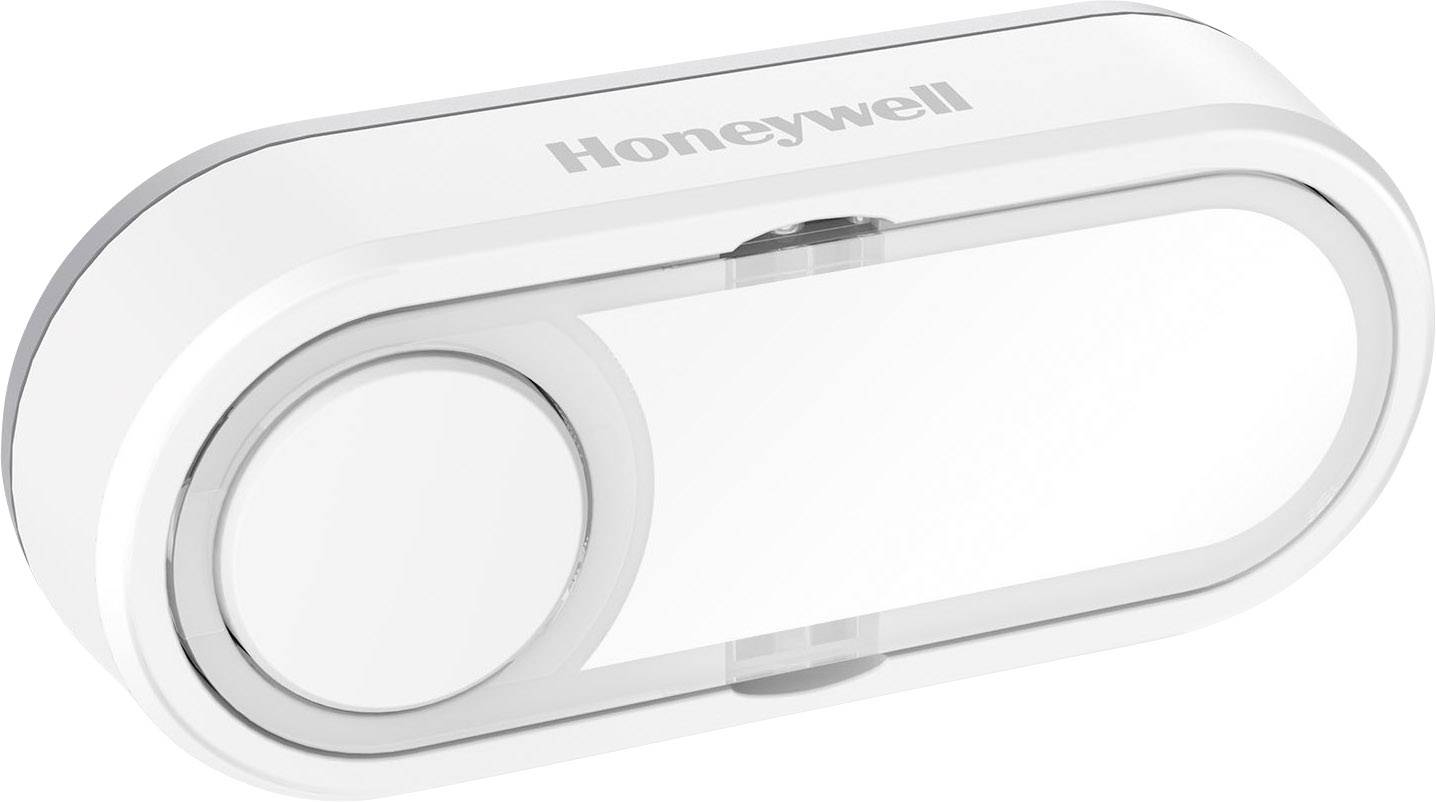 White, oval wireless bell push from Honeywell with central button; compact and modern, wall-mounting possible.