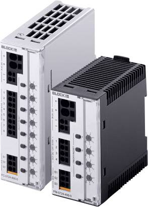 Two electronic device modules side by side. One is black with ventilation slots, the other silver, both with connections.