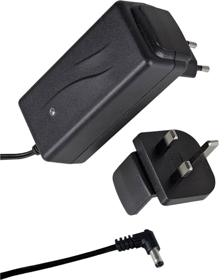 Black power supply with interchangeable plugs for EU and UK, featuring an angled DC connection cable.