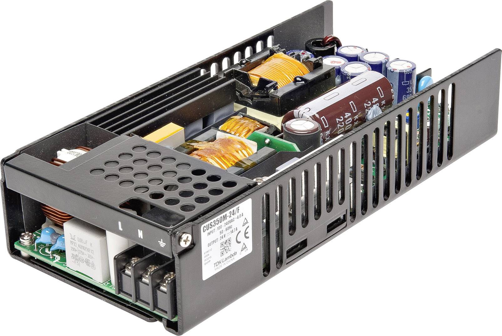 An open power supply unit with visible electronic components such as capacitors, inductors, and heatsinks. Casing with ventilation slots.