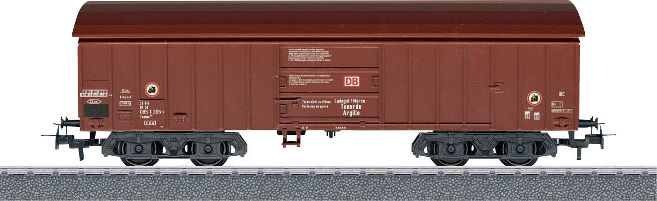 Goods wagon model on a railway track.