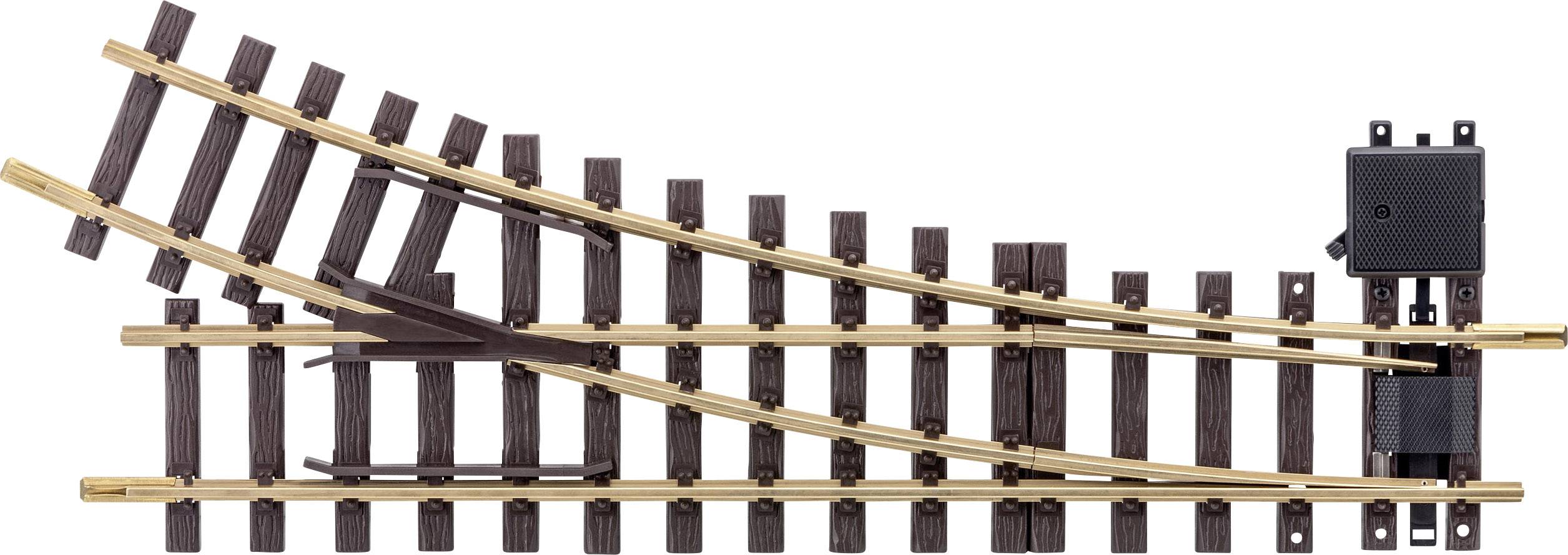Model railway point with wooden and metal rails; on the right is an electrical switch for direction control.
