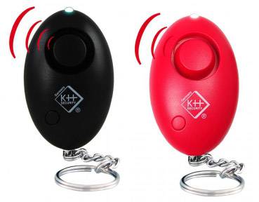 Two key fob alarm devices, one black, one red, with chain and security logo.