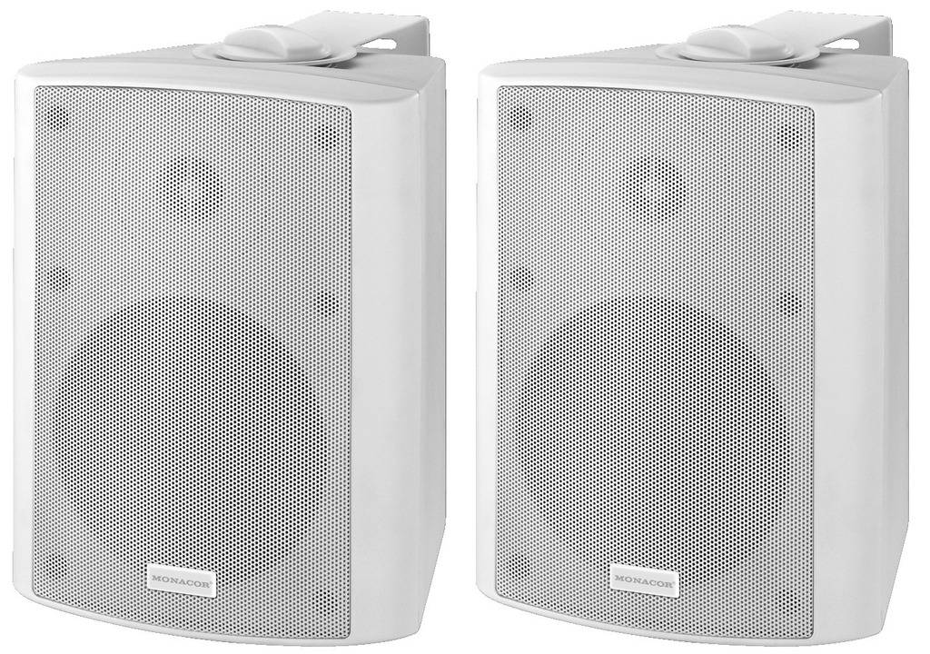 Two white speakers, placed side by side, with a silver grille at the front. Both speakers have a simple, modern design.