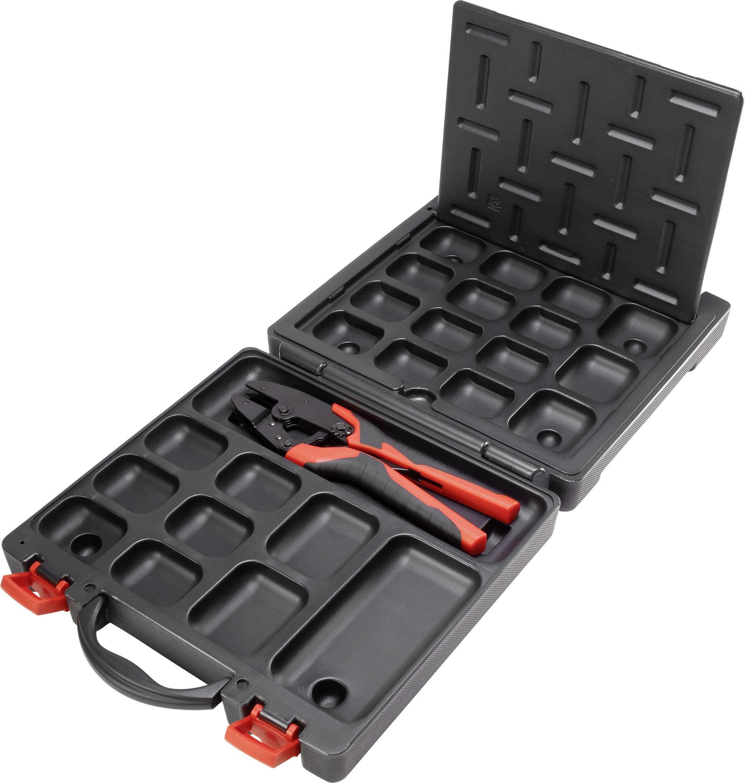 Open toolbox with compartments and pliers inside, on a grey background.
