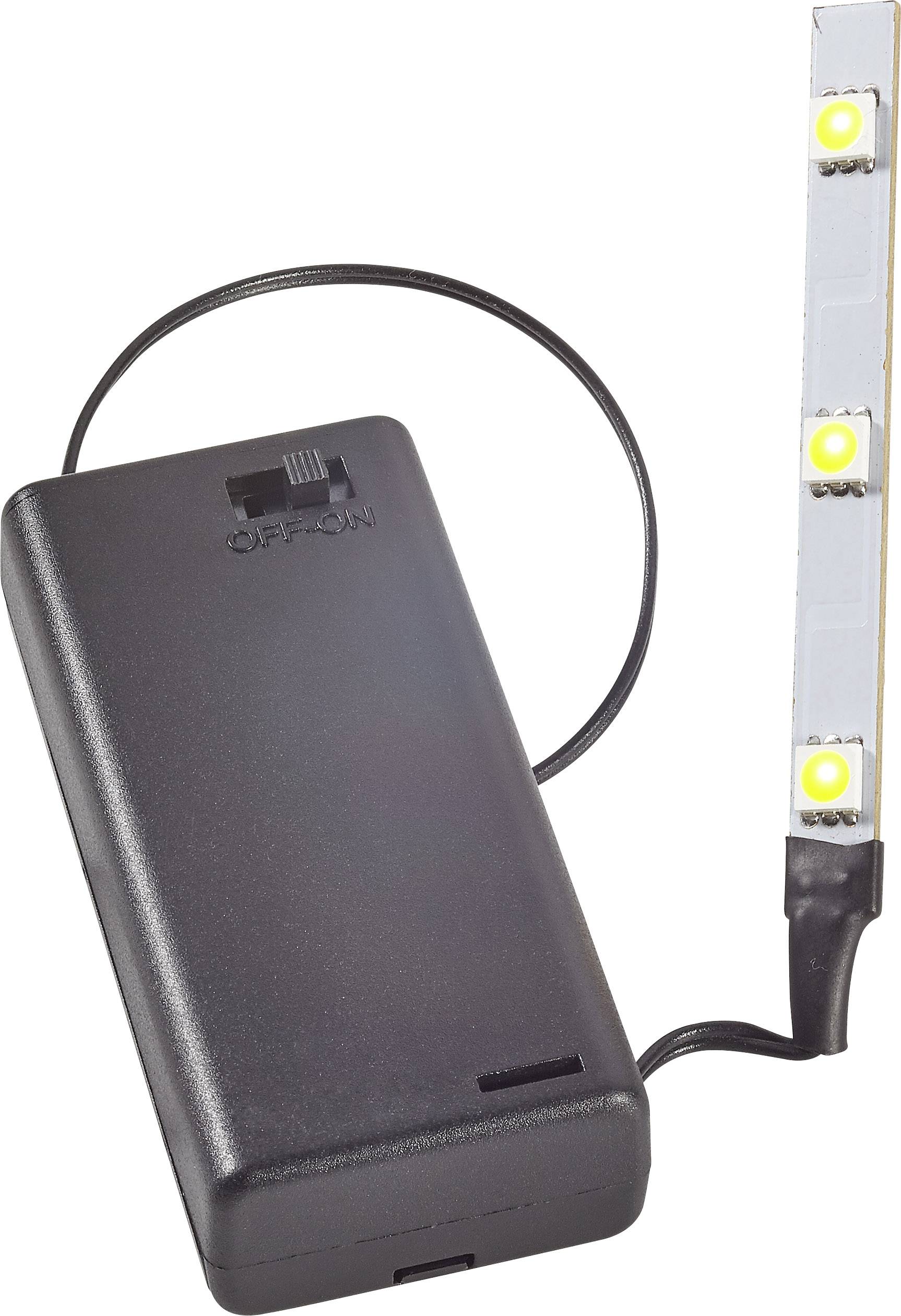 Black battery compartment with a switch and connected LED strip, with three yellow LED lights visible.
