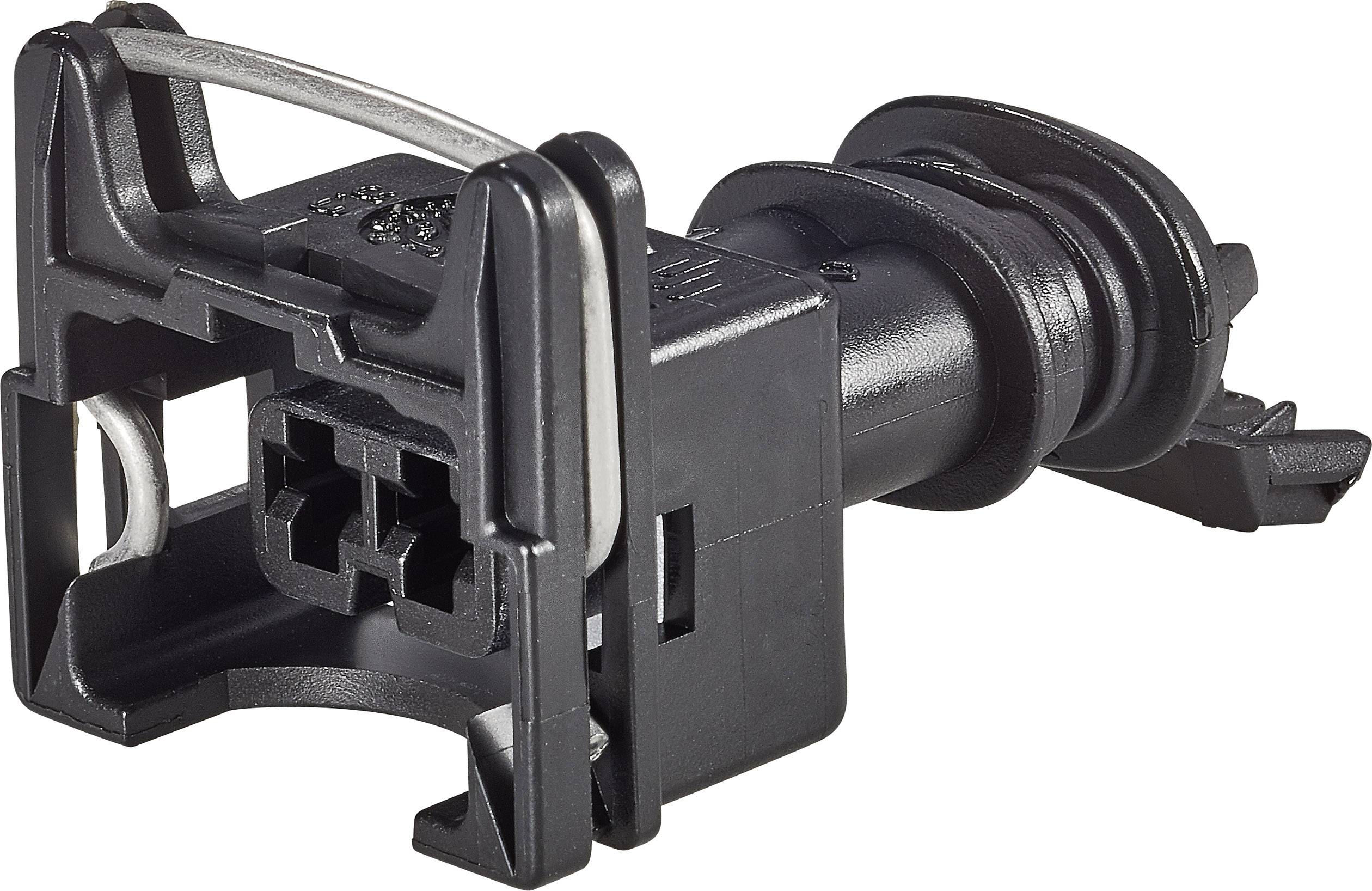 A black, rectangular plug with multiple connection points, likely for electrical connections in vehicles.