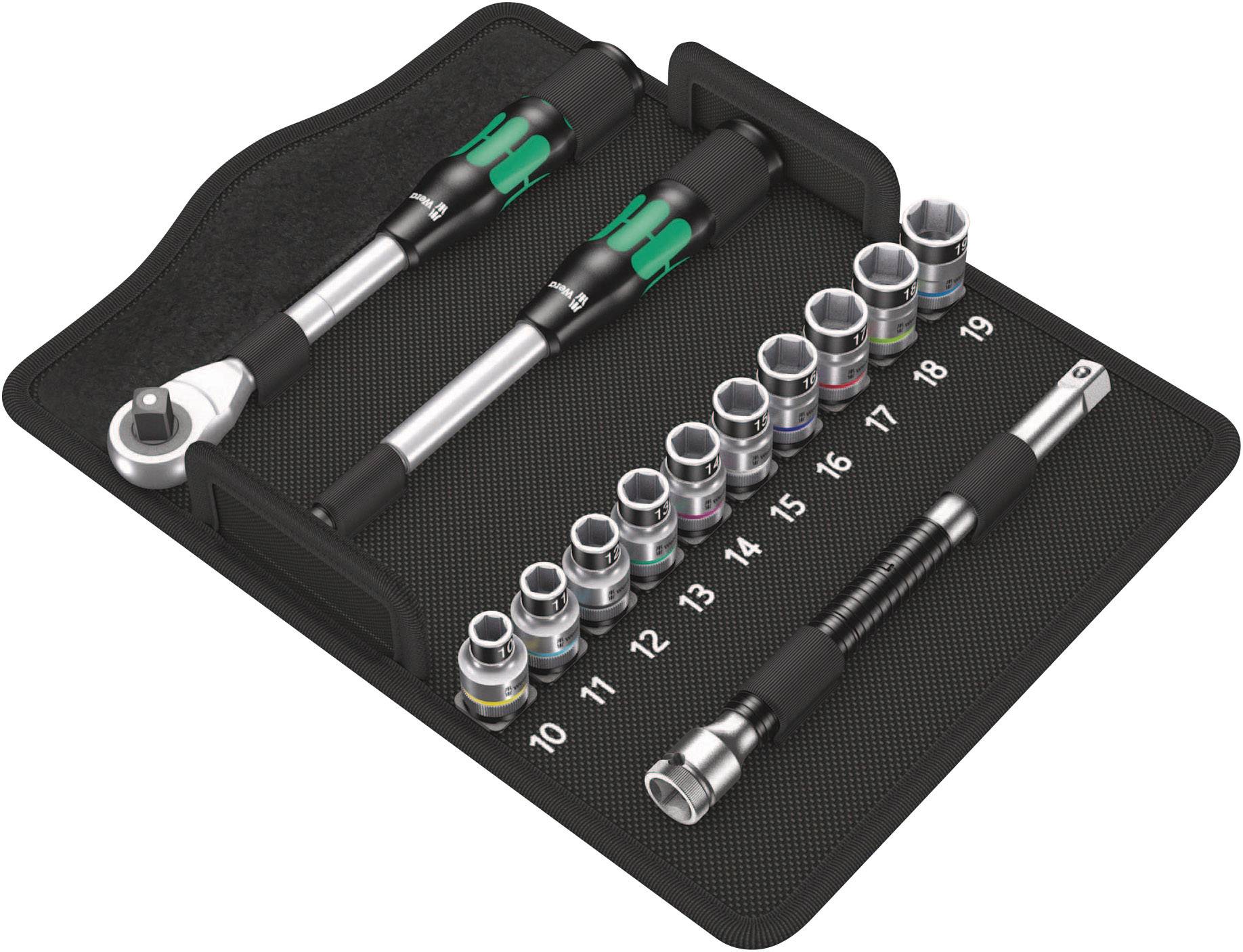 A set of spanners and sockets with size markings from 10 to 19 arranged on a black mat.